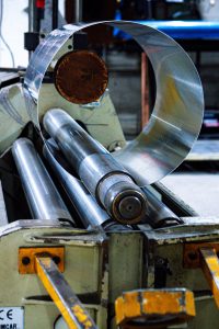 Rolling a medium stainless steel cylinder
