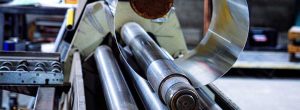 Rolling a small stainless steel cylinder