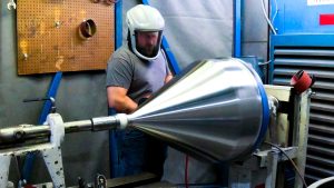 manually polishing a hopper