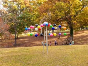 Toledo Metal Spinning Spheres Featured in Sophia Fortuna Dorothea Dix Park Pajaki Art Installation