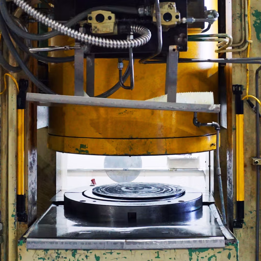 hydro-mechanical pressing