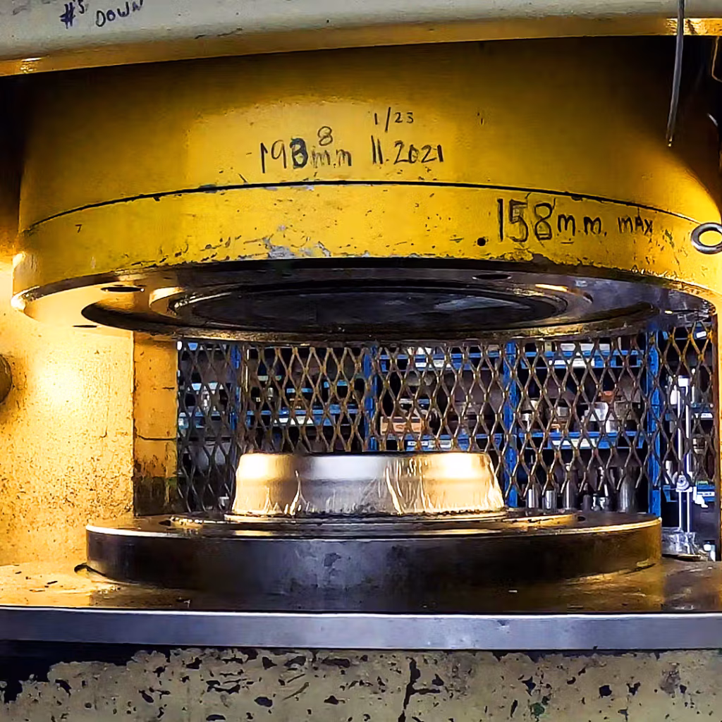 hydroforming a custom metal dish